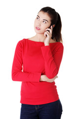 Young woman is calling with a mobile phone