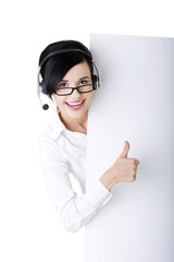 Call center worker holding blank sign board