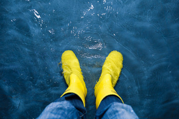 rubber boots in the water