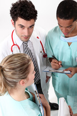 A team of medical professionals conferring