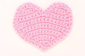 Pink knitted heart.