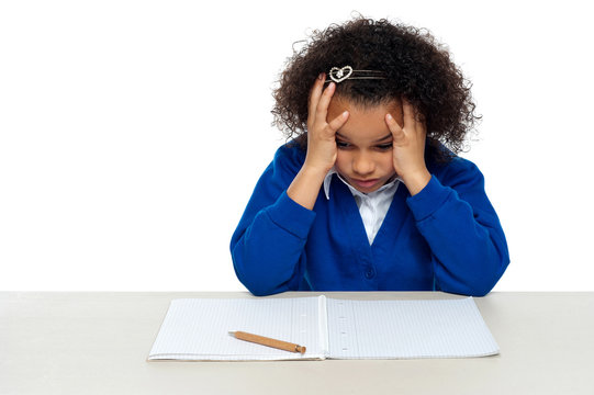 Stressed Out Primary Girl Child Holding Her Head