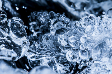 blue ice on a river in detail - macro texture