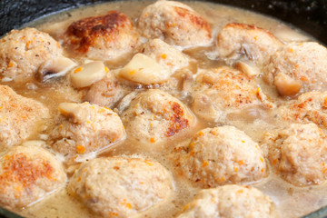 fried meatballs in sauce