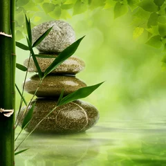 Papier Peint photo Bambou Arrière-plans zen naturels avec feuilles de bambou et galets pour votre d