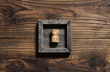 Cork on wooden background