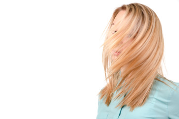 Naklejka premium Blonde woman with the wind in her hair