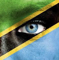 Human face painted with flag of Tanzania