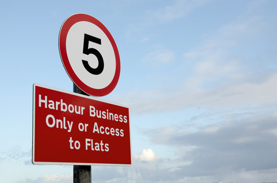 habour sign with speed limit on blue sky