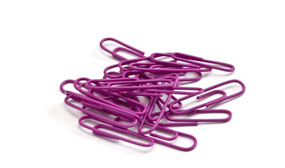Pink paper clips  isolated on white