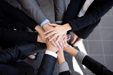 Business team joining hands