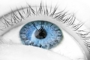 Blue human eye and clock - Life passing concept