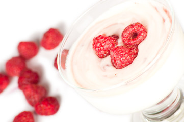 Fresh red raspberries yoghurt