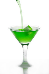 Cocktail poured into martini glass isolated on white