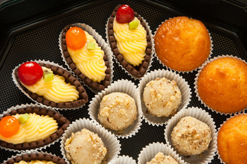 sweet mini tarts in black box