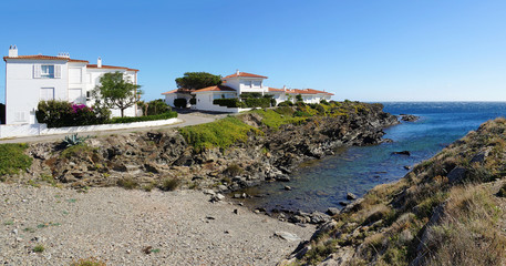 Fototapeta premium Panorama on a cove with waterfront house, village of Cadaques, Costa Brava, Catalonia, Spain, Mediterranean sea