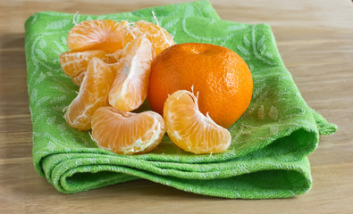 Fresh ripe mandarines  on wooden background