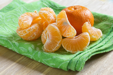 Fresh ripe mandarines  on wooden background