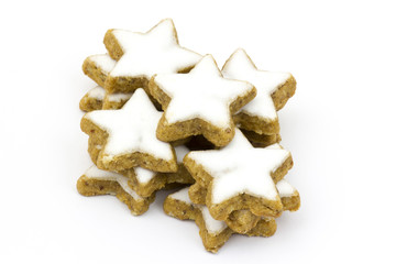 typical christmas cinnamon star cookies and cinnamon sticks