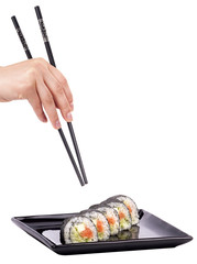 Sushi - Roll  with chopsticks isolated