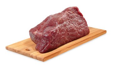 Beef on a wooden board