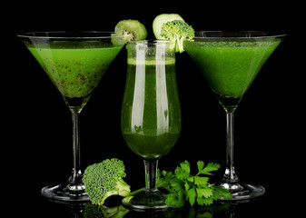 Three kinds of green juice in coctail glasses