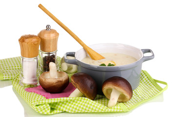 Mashed potatoes in saucepan with ingredients isolated on white