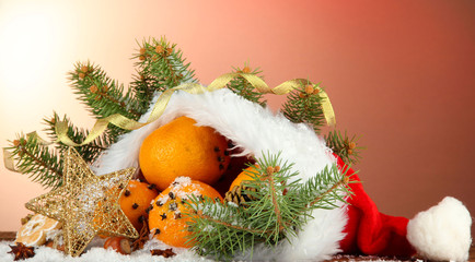 christmas composition with oranges and fir tree in Santa Claus