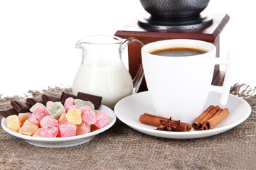 White cup of Turkish coffee with rahat delight and milk