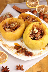 Baked apples on plate close up