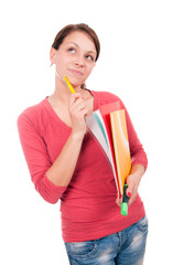 Young student girl with notebooks isolated on white background