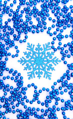 Snowflake decoration with beads, isolated on white