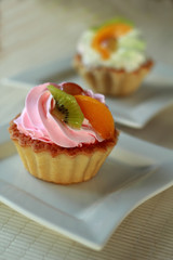 Two pastries on a saucer