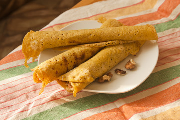 Pancakes made of corn flour with honey and nuts