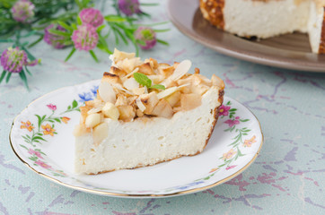 piece of cottage cheese pie with apples on a plate