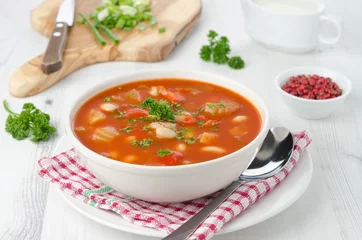Foto op Plexiglas bowl of roasted tomato soup with beans, celery and sweet pepper © cook_inspire