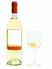 white wine near wineglass with grape