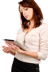 Young woman reading her tablet