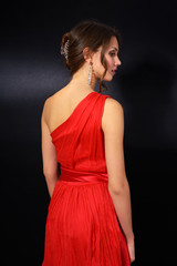 Fototapeta premium elegant young woman in red dress