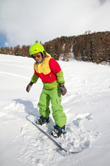 Fototapeta na wymiar lady snowboarder