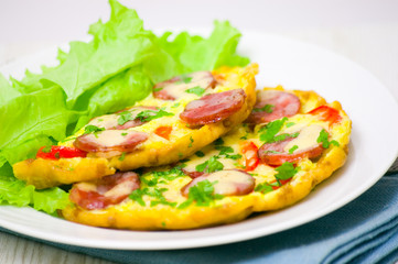 Omelet with sausage and vegetables