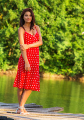 Young woman posing, outside shot in summer day