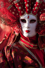 Masks in San Marco square during carnival of Venice