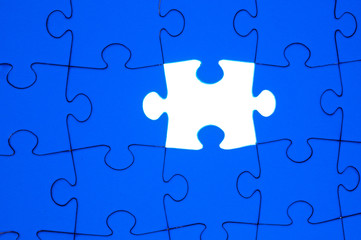 Fototapeta premium Completing the missing Jigsaw puzzle concept for business / comp
