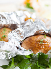 potatoes roasted in a peel on grill