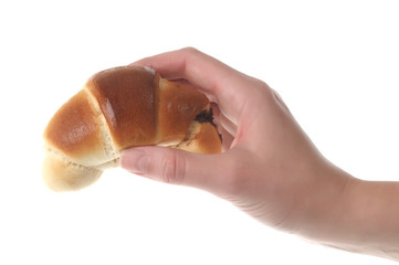 Women hand holding roll croissants