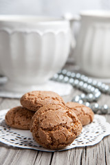 Cup of coffe or tea and cookies on wooden background