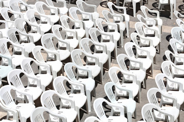 Rows of chairs for outdoor dehors alfresco bar and live gig conc
