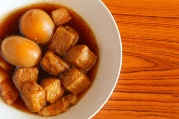 Hard boiled egg in sweet gravy