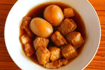Hard boiled egg in sweet gravy